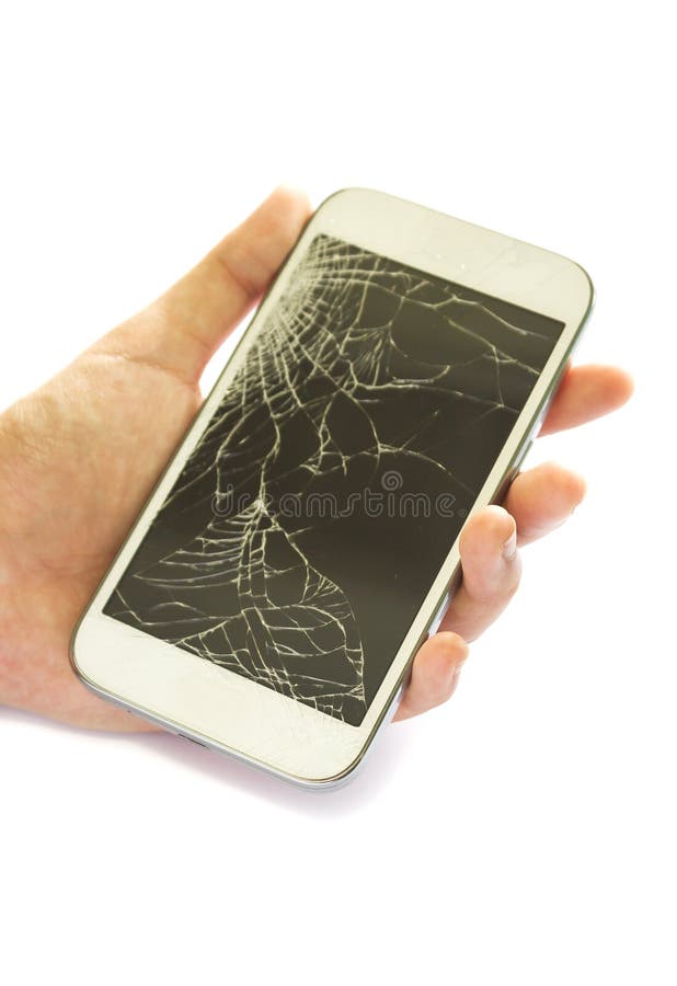 La main de la femme tenant l'écran tactile cassé du téléphone intelligent blanc image libre de droits La main de la femme tenant l'écran tactile cassé du téléphone intelligent blanc image libre de droits