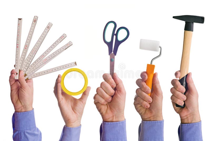 La main de travailleur de sexe masculin tenant de divers outils du commerce de métier images libres de droits La main de travailleur de sexe masculin tenant de divers outils du commerce de métier images libres de droits