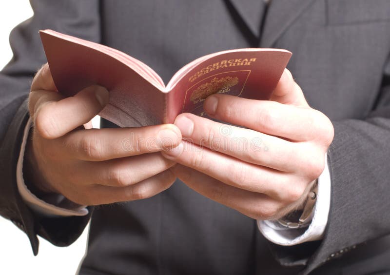 Men's hand showing passport in a customs control. Men's hand showing passport in a customs control