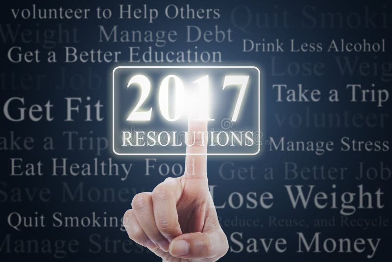 La main touche des résolutions avec les numéros 2017 photo libre de droits La main touche des résolutions avec les numéros 2017 photo libre de droits