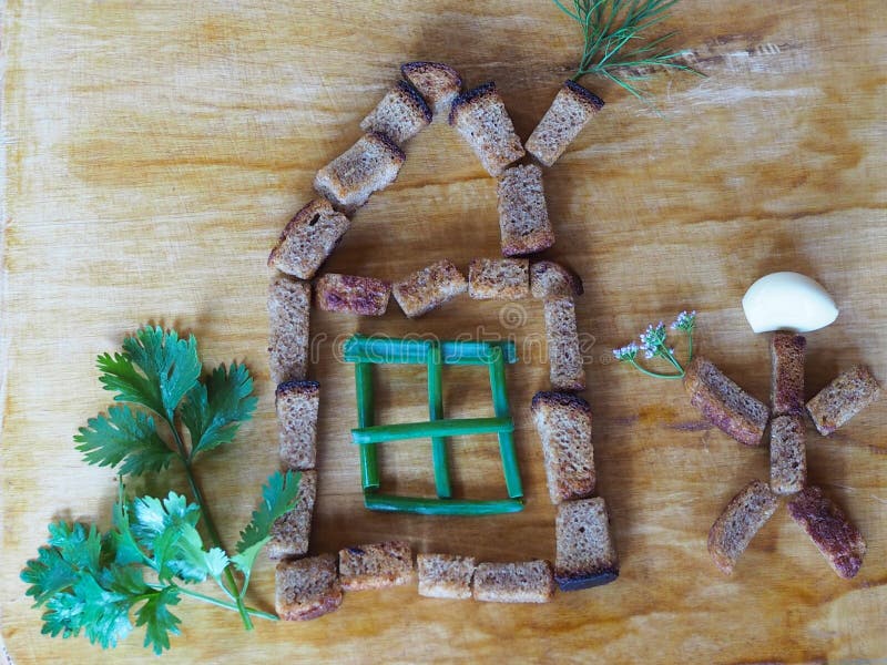 La maison et le petit homme des biscuits et des verts de seigle photos libres de droits La maison et le petit homme des biscuits et des verts de seigle photos libres de droits