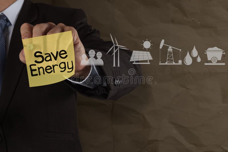 La mano dell'uomo d'affari disegna l'energia di risparmi sulla nota appiccicosa con le icone e illustrazione di stock