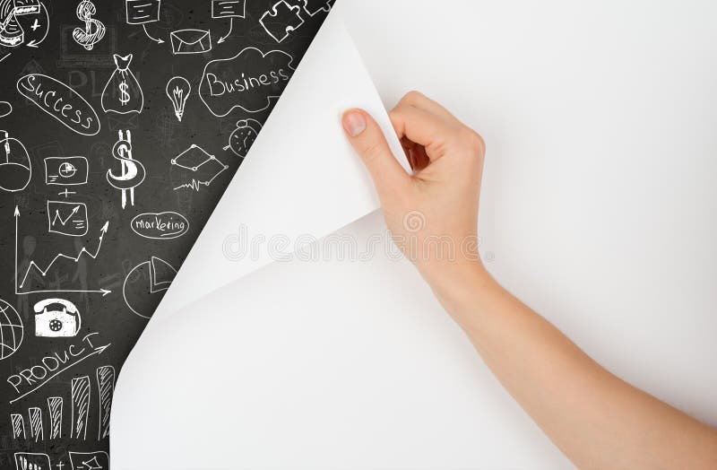 La mano gira la pagina ed il concetto del disegno sulla lavagna fotografia stock La mano gira la pagina ed il concetto del disegno sulla lavagna fotografia stock