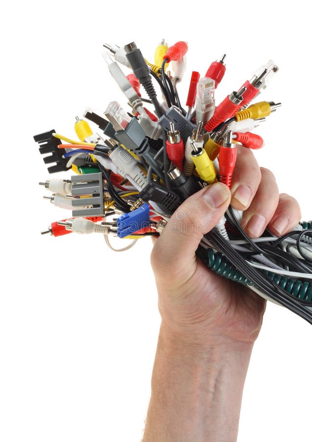 Hand holds set of cables with digital connectors isolated on white. Hand holds set of cables with digital connectors isolated on white