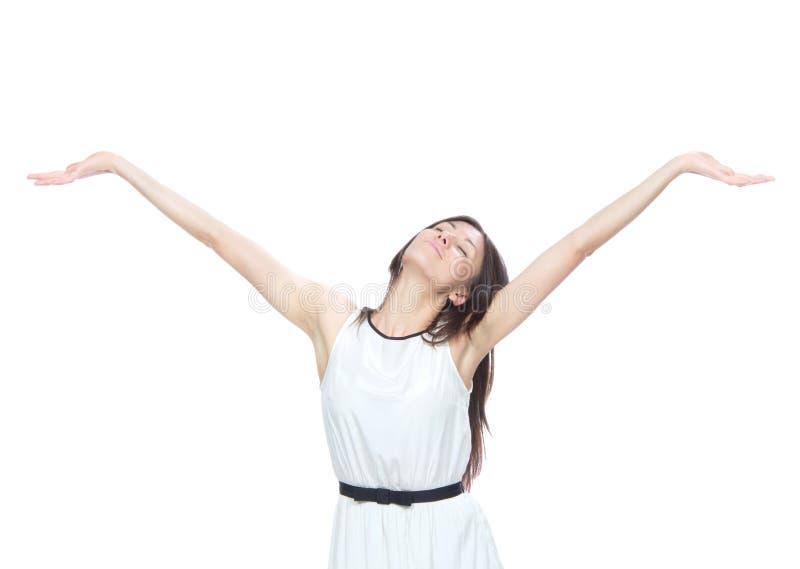 Young pretty woman with arms open feeling freedom and happiness isolated on a white background. Young pretty woman with arms open feeling freedom and happiness isolated on a white background