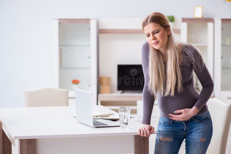 Pregnant woman at home getting ready for childbirth. Pregnant woman at home getting ready for childbirth