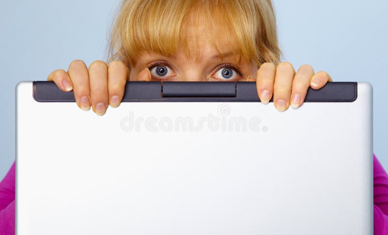 Frightened, the woman was guilty and hides behind a computer screen. Frightened, the woman was guilty and hides behind a computer screen