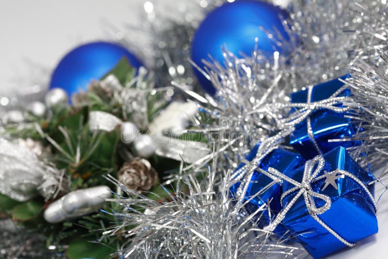 Christmas motive with gift and balls in blue tone. Christmas motive with gift and balls in blue tone