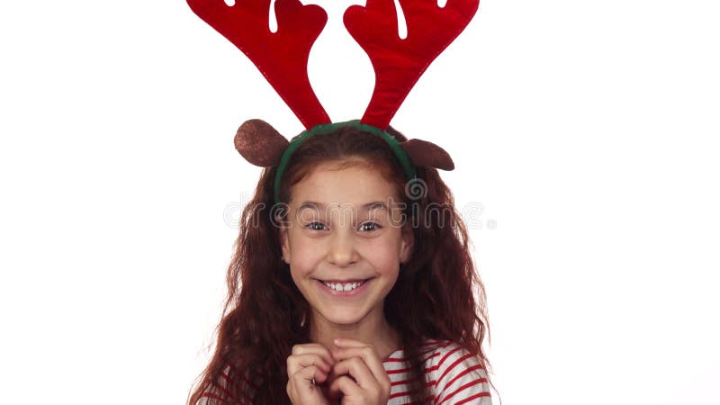 La niña es feliz sobre días de fiesta del Año Nuevo foto de archivo La niña es feliz sobre días de fiesta del Año Nuevo foto de archivo