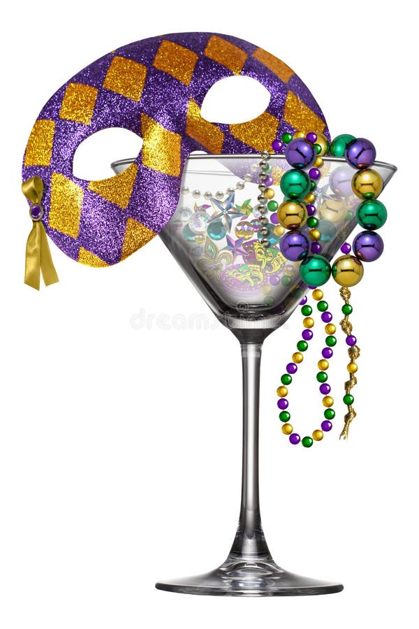 Isolated on white classic New Orleans legendary Mardi Gras martini glass filled with colorful purple, green, and gold beads in celebration. Isolated on white classic New Orleans legendary Mardi Gras martini glass filled with colorful purple, green, and gold beads in celebration