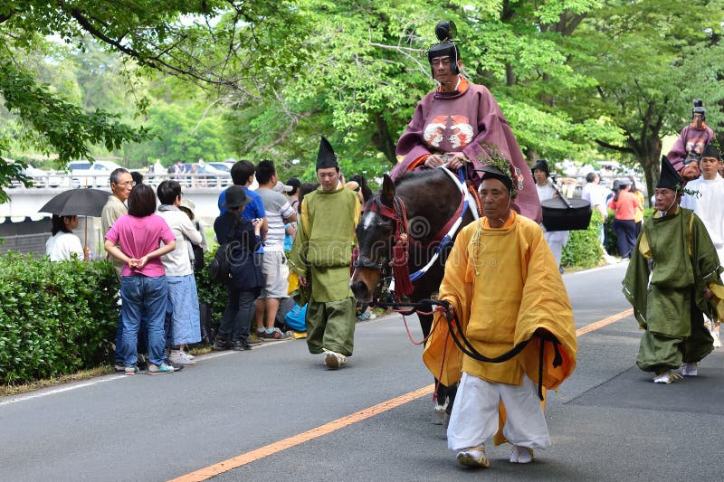 La parata del festival di Kyoto Aoi, Giappone fotografia stock La parata del festival di Kyoto Aoi, Giappone fotografia stock
