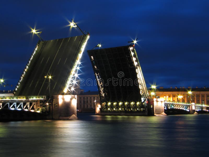 Night view of raised Palace Bridge in St.Petersburg, Russia. Night view of raised Palace Bridge in St.Petersburg, Russia.