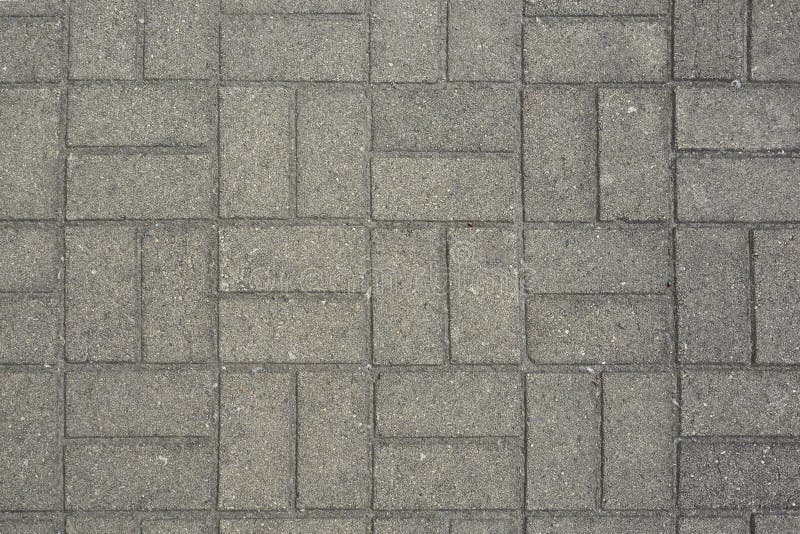 La pavimentazione piastrella il fondo alto vicino di struttura fotografia stock La pavimentazione piastrella il fondo alto vicino di struttura fotografia stock