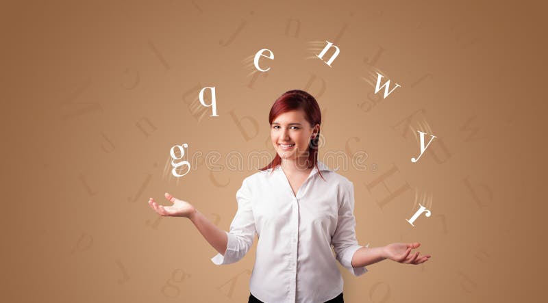 La persona hace juegos malabares con las letras imagen de archivo La persona hace juegos malabares con las letras imagen de archivo