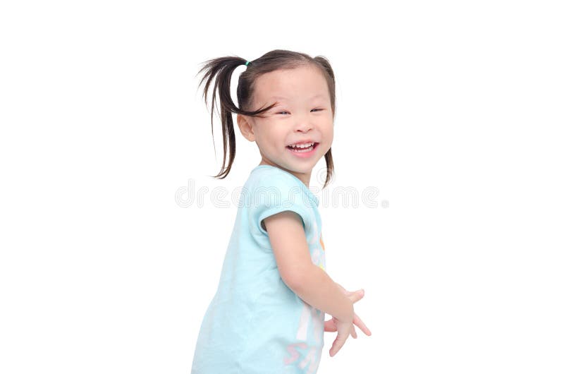 La petite fille sourit au-dessus du blanc photographie stock