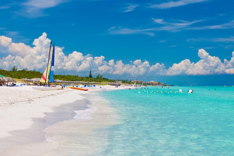 The beautiful cuban beach of Varadero with sailing boats, white sand and cristal clear turquoise water. The beautiful cuban beach of Varadero with sailing boats, white sand and cristal clear turquoise water