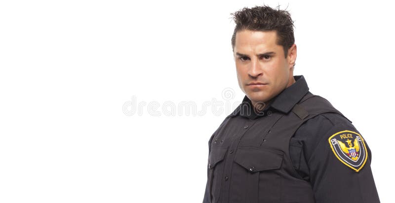 Portrait of serious police man standing against white background. Portrait of serious police man standing against white background