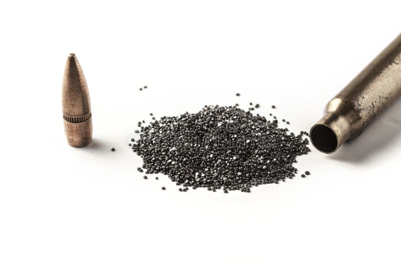 Bullet and gunpowder isolated on white background with shadow. Bullet and gunpowder isolated on white background with shadow