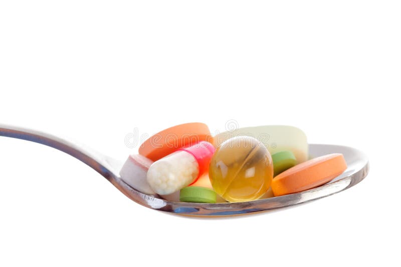 La porción droga las vitaminas y otras píldoras imagen de archivo La porción droga las vitaminas y otras píldoras imagen de archivo