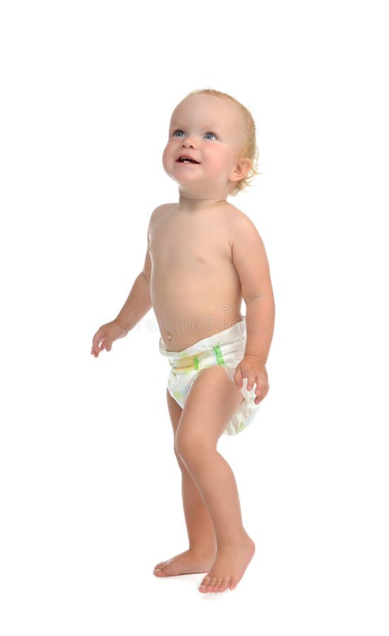 La position infantile d'enfant en bas âge d'enfant de bébé d'enfant font le regard de premières étapes photo libre de droits La position infantile d'enfant en bas âge d'enfant de bébé d'enfant font le regard de premières étapes photo libre de droits