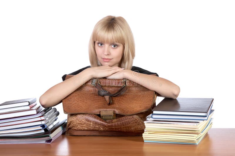 La ragazza con una vecchia cartella in mani fotografie stock libere da diritti La ragazza con una vecchia cartella in mani fotografie stock libere da diritti