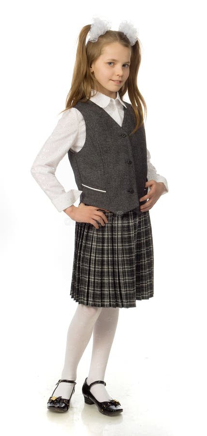 La ragazza della ciliegia in un uniforme scolastico immagini stock libere da diritti La ragazza della ciliegia in un uniforme scolastico immagini stock libere da diritti