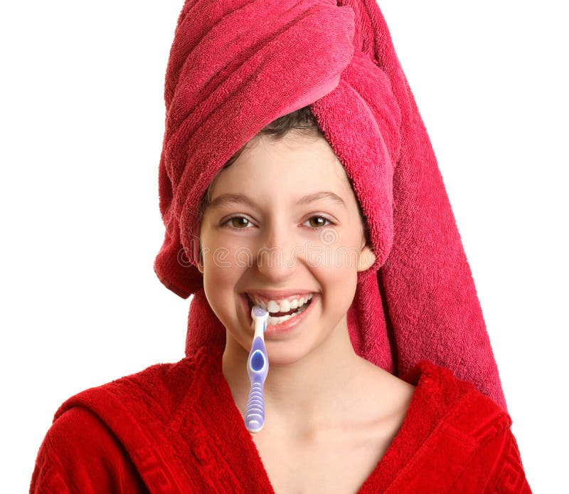 La ragazza pulisce i denti fotografie stock La ragazza pulisce i denti fotografie stock