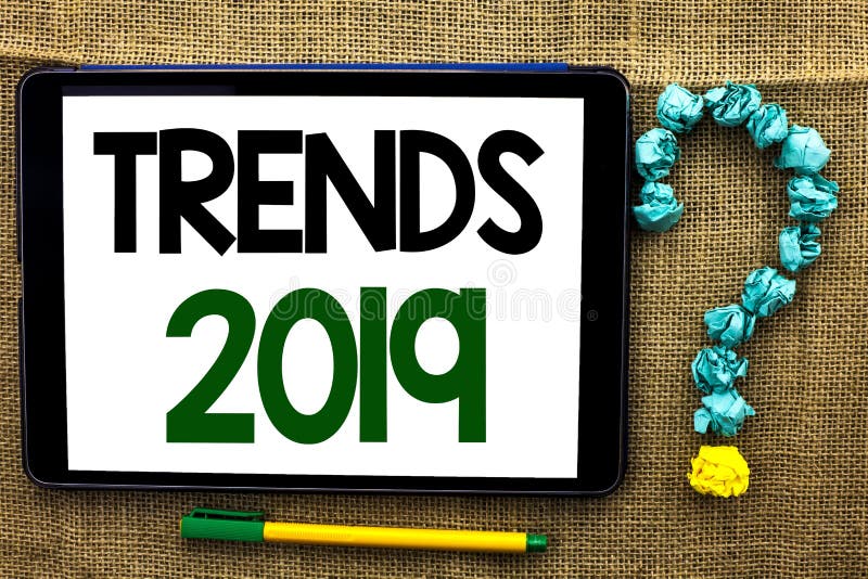 Conceptual hand writing showing Trends 2019. Business photo text Current Movement Latest Branding New Concept Prediction written Tablet the jute background Pen next to it Ask for. Conceptual hand writing showing Trends 2019. Business photo text Current Movement Latest Branding New Concept Prediction written Tablet the jute background Pen next to it Ask for.