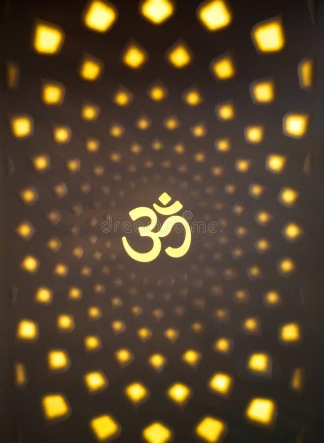 hindu religion focused aum letter surrounded by the lights in a geometrical spherical form. hindu religion focused aum letter surrounded by the lights in a geometrical spherical form