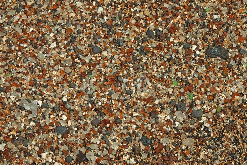 La spiaggia di vetro di Kauai, Hawai ha ruzzolato frammenti della bottiglia fotografia stock libera da diritti La spiaggia di vetro di Kauai, Hawai ha ruzzolato frammenti della bottiglia fotografia stock libera da diritti
