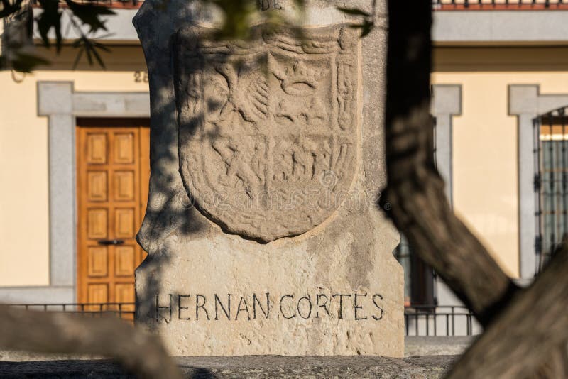 MEDELLIN, EXTREMADURA, SPAIN - FEBRUARY 13, 2019: The coat of arms of Hernan Cortes in a monolith that indicates the place of his room in a square of Medellin, Extremadura, Spain. The foundations of the house in which the Spanish Conquistador Hernan Cortes was born, in the aquare of the same name in Medellin, have recently been found. MEDELLIN, EXTREMADURA, SPAIN - FEBRUARY 13, 2019: The coat of arms of Hernan Cortes in a monolith that indicates the place of his room in a square of Medellin, Extremadura, Spain. The foundations of the house in which the Spanish Conquistador Hernan Cortes was born, in the aquare of the same name in Medellin, have recently been found.