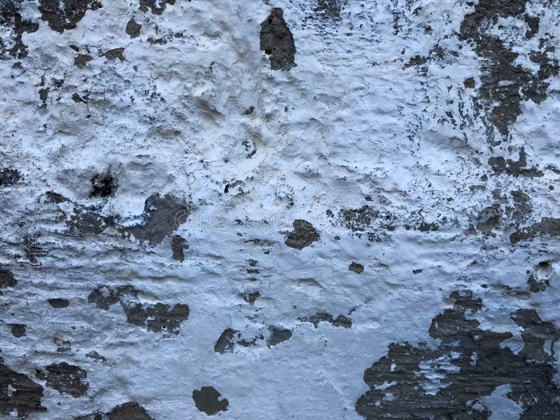 La struttura di vecchio cemento concreto grigio ha intonacato la parete con l'ammaccatura delle crepe nei modelli e divorzio di f immagine stock La struttura di vecchio cemento concreto grigio ha intonacato la parete con l'ammaccatura delle crepe nei modelli e divorzio di f immagine stock