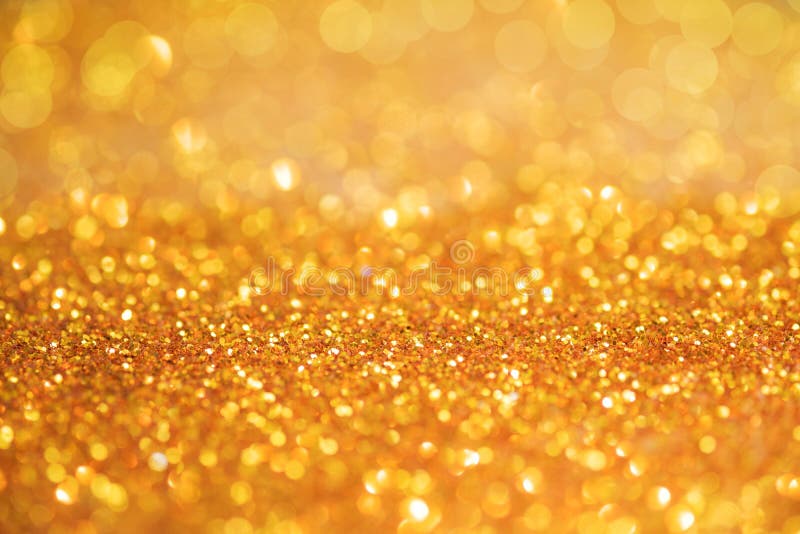 La struttura o lo scintillio leggera del bokeh dell'oro accende il backgrou festivo dell'oro fotografie stock libere da diritti La struttura o lo scintillio leggera del bokeh dell'oro accende il backgrou festivo dell'oro fotografie stock libere da diritti