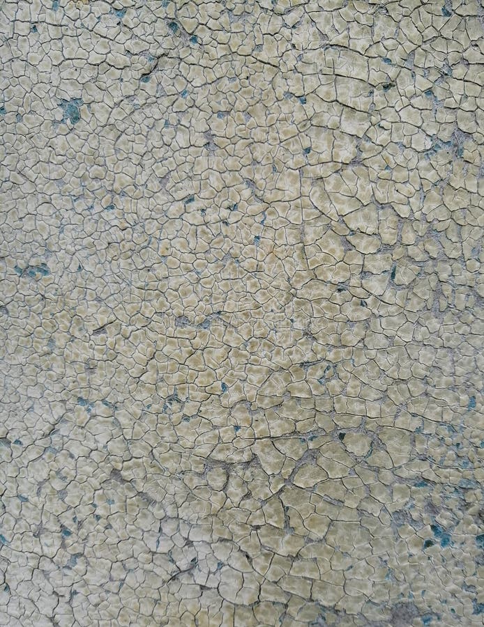 La surface d'un vieux mur peint à la peinture mal fissurée photos libres de droits La surface d'un vieux mur peint à la peinture mal fissurée photos libres de droits