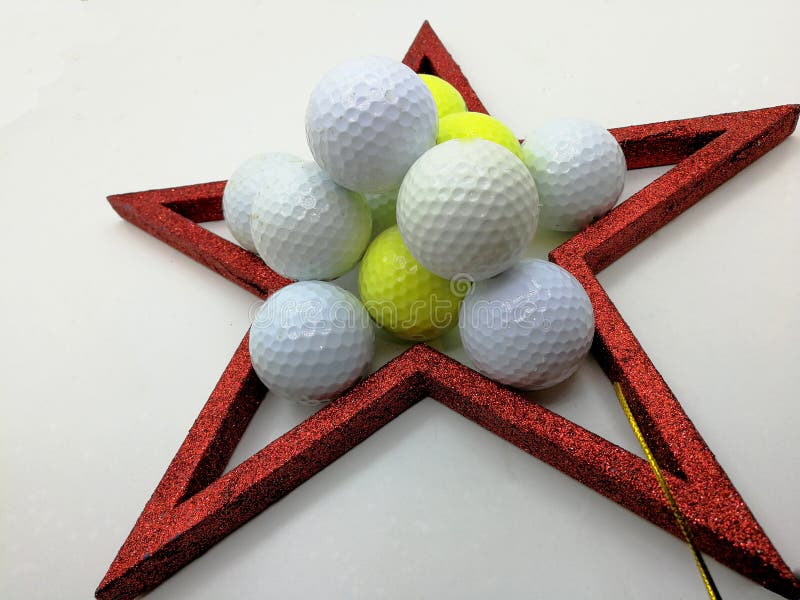 Christmas unusual card inspired by golf framed by a red star. Christmas unusual card inspired by golf framed by a red star