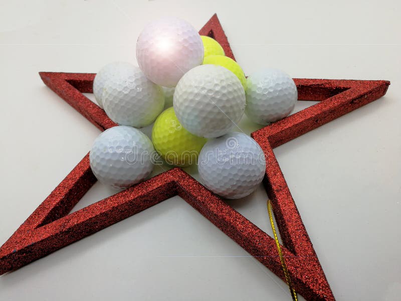 Christmas unusual card inspired by golf framed by a red star. Christmas unusual card inspired by golf framed by a red star