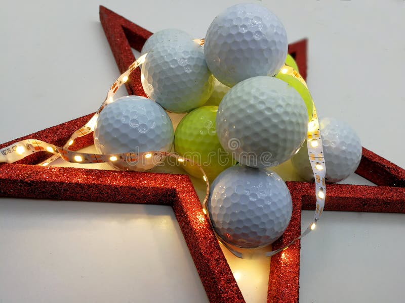 Christmas card inspired by balls golf framed by a red star. Christmas card inspired by balls golf framed by a red star