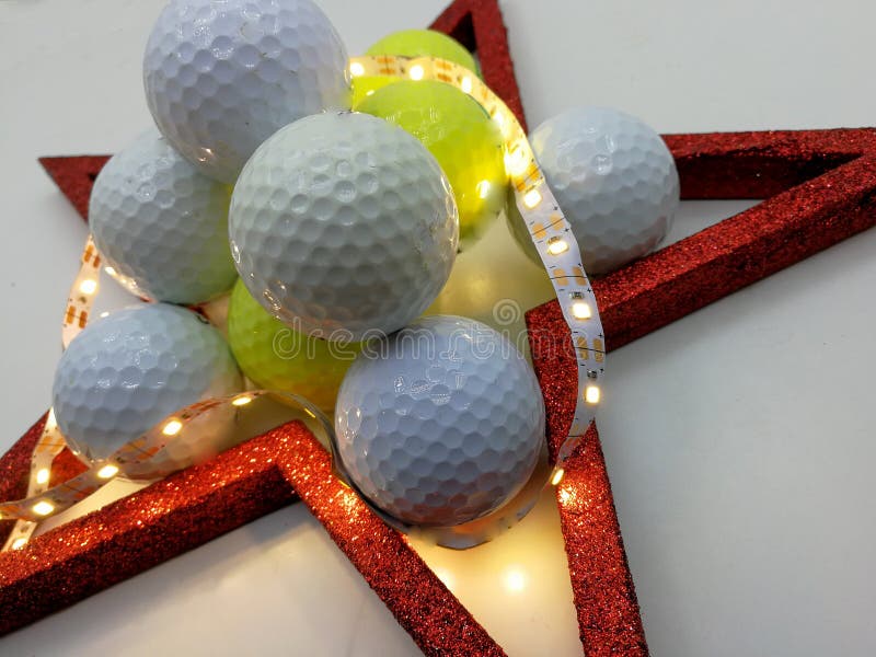 Christmas card inspired by balls golf framed by a red star. Christmas card inspired by balls golf framed by a red star