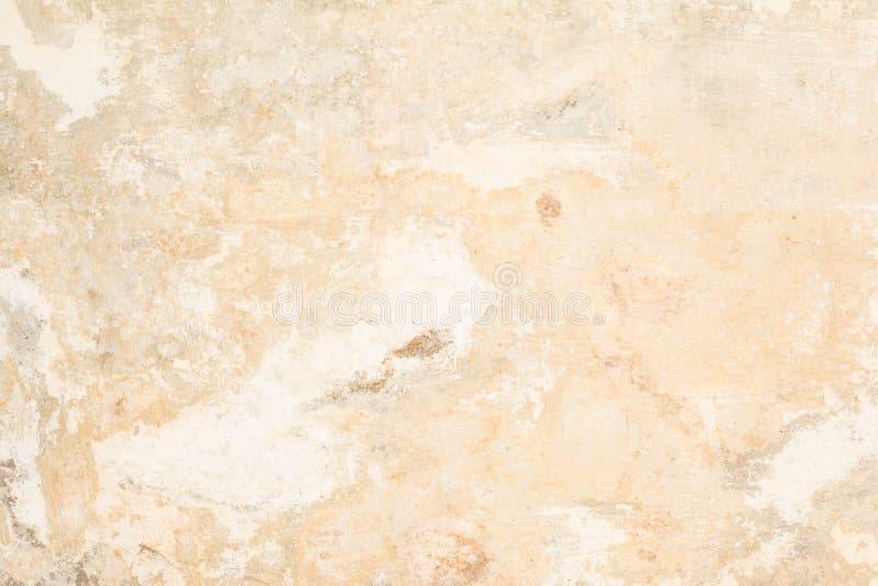 La textura de la pared antigua vieja del color de la amarillo-arena, allí es fracturas de la capa protectora blanca de yeso del e imágenes de archivo libres de regalías La textura de la pared antigua vieja del color de la amarillo-arena, allí es fracturas de la capa protectora blanca de yeso del e imágenes de archivo libres de regalías