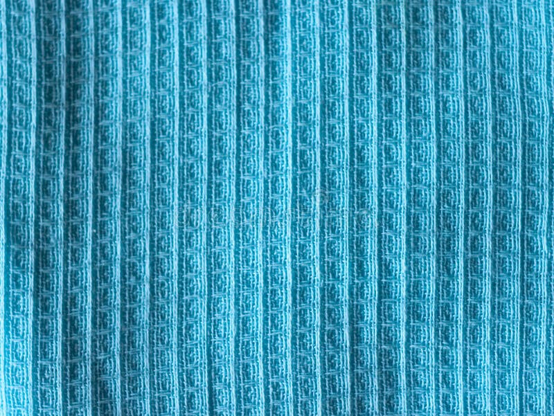 La texture d'un fond azuré coloré chiffonné de texture de tissu de couleur de ciel bleu photos libres de droits La texture d'un fond azuré coloré chiffonné de texture de tissu de couleur de ciel bleu photos libres de droits