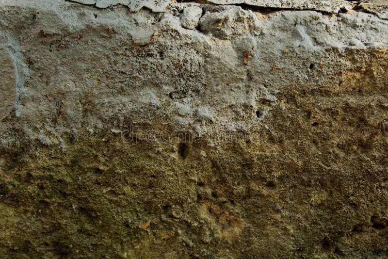 La texture de sable sur le mur a partiellement couvert photo libre de droits La texture de sable sur le mur a partiellement couvert photo libre de droits