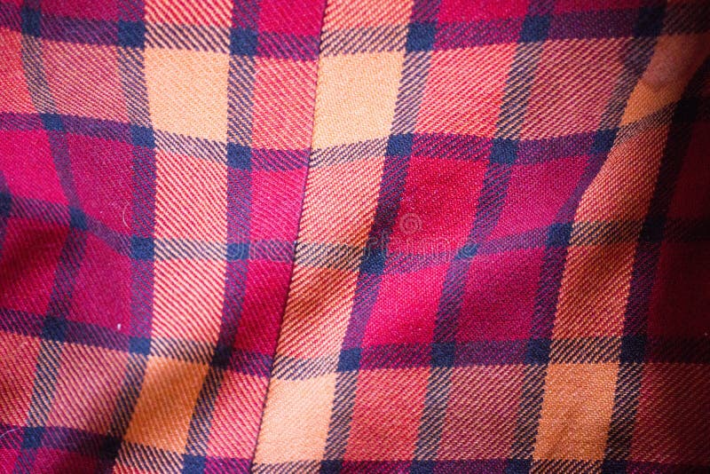 La texture du tissu rouge de plaid de laine image stock La texture du tissu rouge de plaid de laine image stock