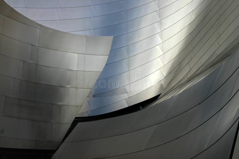 Shot of a segment of wall of the LA opera house designed by Frank Gehry. Excellent for use as a background. Subtle color variations and gradients mixing with reflections. Very crisp. Metal n stock images, royalty-free photos and pictures