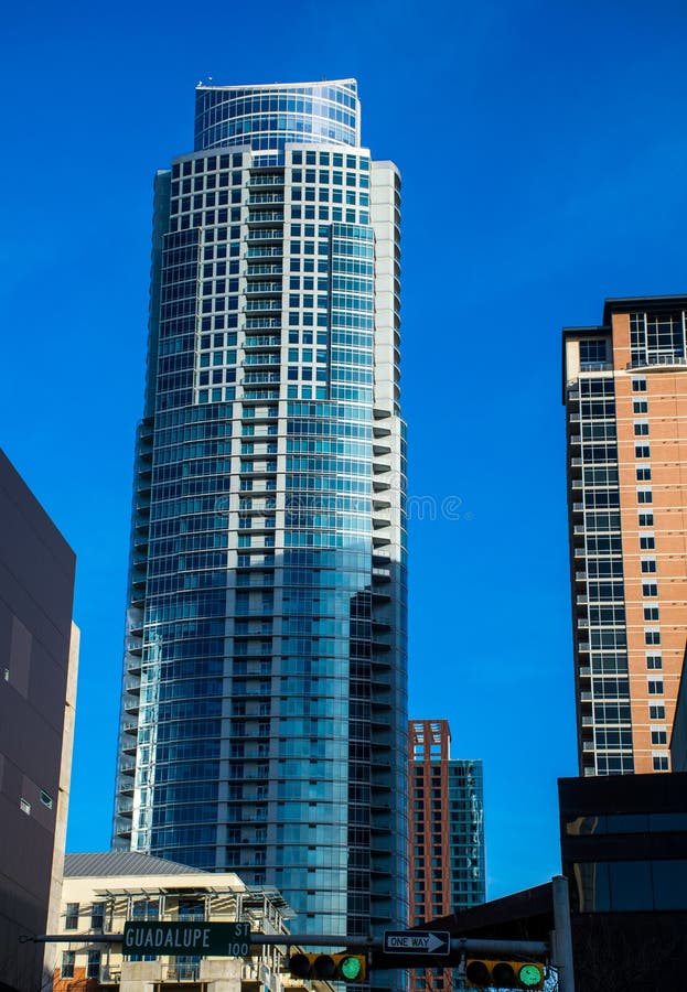 The Austonian tower in Austin Texas downtown district is the highest building in central texas and is the highest residential building in texas. a wonderful beautiful tower. with street sign guadalupe st. The Austonian tower in Austin Texas downtown district is the highest building in central texas and is the highest residential building in texas. a wonderful beautiful tower. with street sign guadalupe st