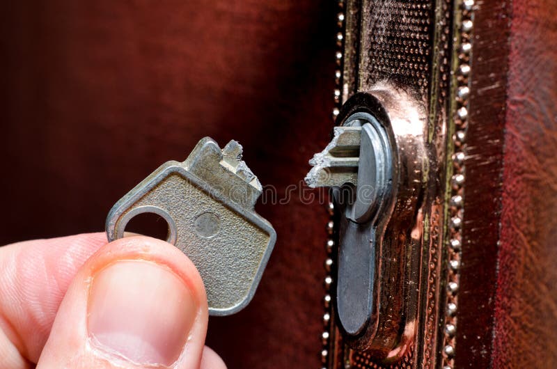 La touche d'interruption dans la serrure photos stock La touche d'interruption dans la serrure photos stock