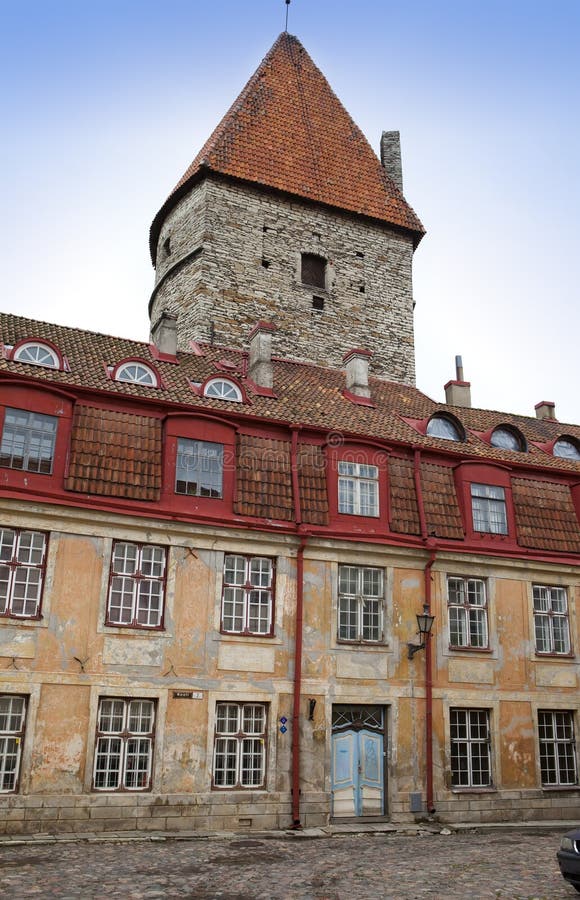 Old house and fortification tower on the Old city street. Tallinn Estonia. Old house and fortification tower on the Old city street. Tallinn Estonia