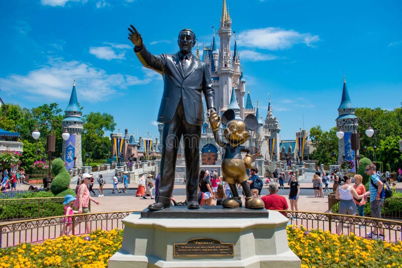 Orlando, Florida. May 16, 2019. View of Partners Statue This statue of Walt Disney and Mickey Mouse  is positioned in front of Cinderella Castle in Magic Kingdom at Walt Disney World  2. Orlando, Florida. May 16, 2019. View of Partners Statue This statue of Walt Disney and Mickey Mouse  is positioned in front of Cinderella Castle in Magic Kingdom at Walt Disney World  2