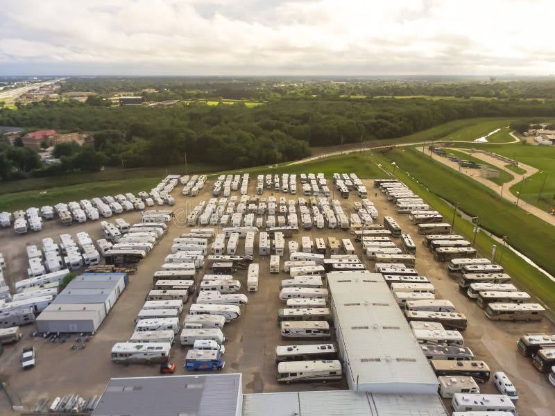 Aerial view new, pre-owned and consigned recreational vehicle at RV dealership, consignment parking lots in Houston, Texas, USA. Aerial view new, pre-owned and consigned recreational vehicle at RV dealership, consignment parking lots in Houston, Texas, USA