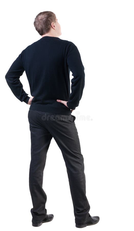 La vue arrière de l'homme d'affaires pense à l'avenir image libre de droits La vue arrière de l'homme d'affaires pense à l'avenir image libre de droits
