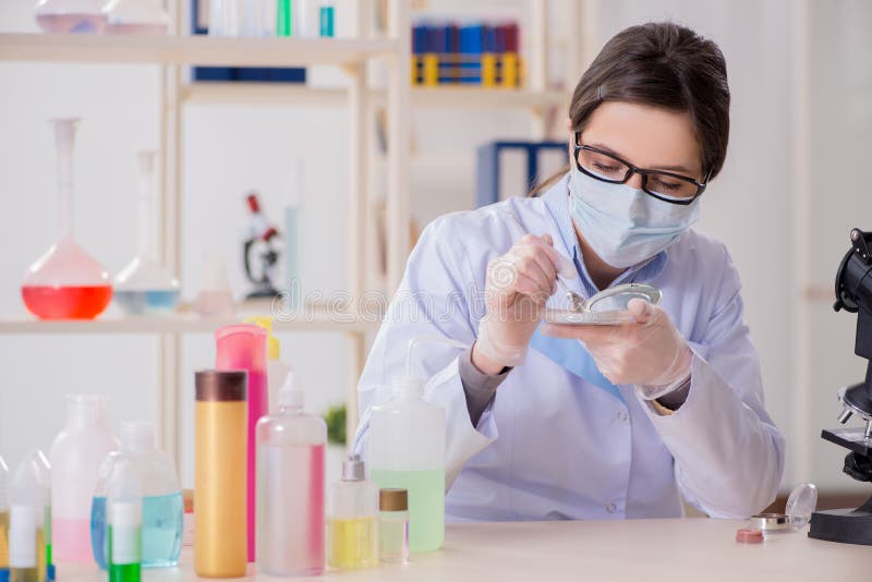 The Lab Chemist Checking Beauty and Makeup Products Stock Image